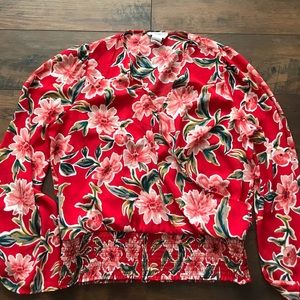 Red floral blouse